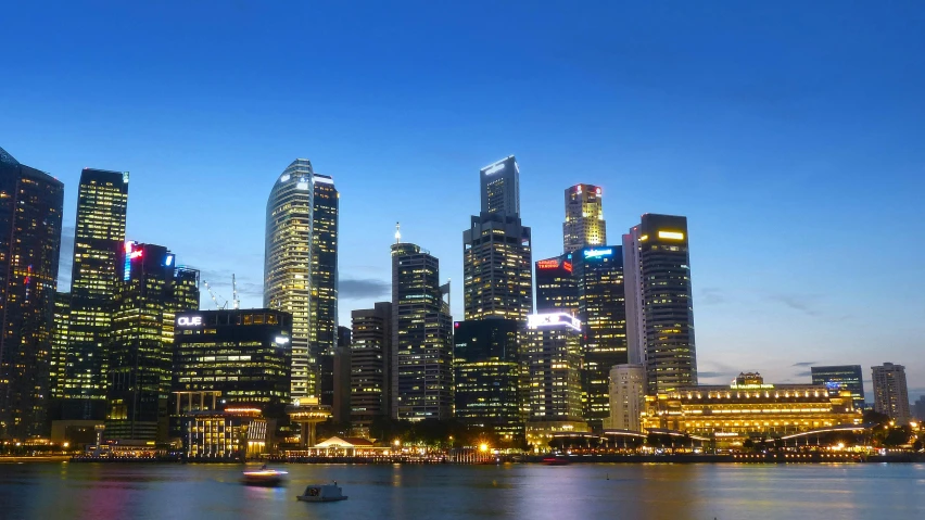 the city skyline is lit up at night, pexels contest winner, hyperrealism, lee kuan yew, white marble buildings, late summer evening, south east asian with long