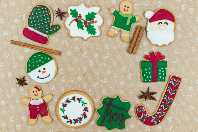 christmas cookies arranged in a circle on a table, by Sylvia Wishart, pexels, naive art, background image, fabric embroidery, rectangle, thumbnail