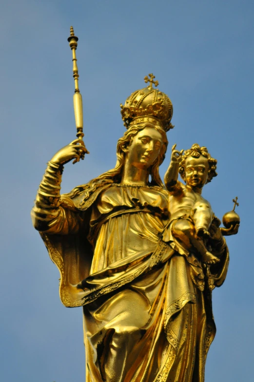 a golden statue of a woman holding a sword, a statue, flickr, baroque, with infant jesus, square, olive, mega