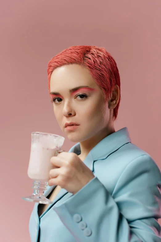 a woman with red hair holding a glass of milk, an album cover, inspired by Cosmo Alexander, trending on pexels, pink short hair, anastasia ovchinnikova, headshot profile picture, ice cream