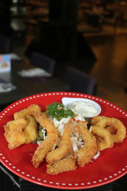 a close up of a plate of food on a table, krakens, battered, thumbnail, long fingers