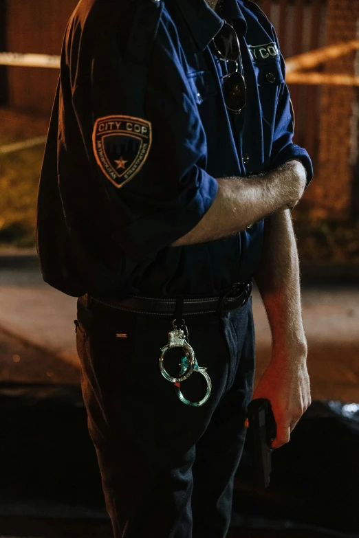 a police officer standing in front of a crime scene, by Adam Marczyński, pexels, symbolism, leather cuffs around wrists, at twilight, hybrid of pig and nyc policeman, close - up portrait shot