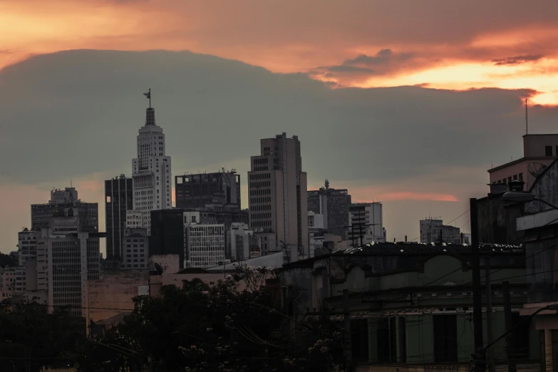 a view of a city from the top of a hill, by Ceferí Olivé, pexels contest winner, brutalism, crepuscule, avenida paulista, stacked image, ad image