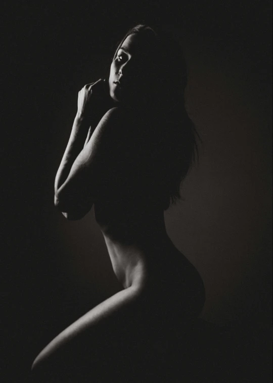 a black and white photo of a nude woman, instagram model, backlit glow, various posed, dark