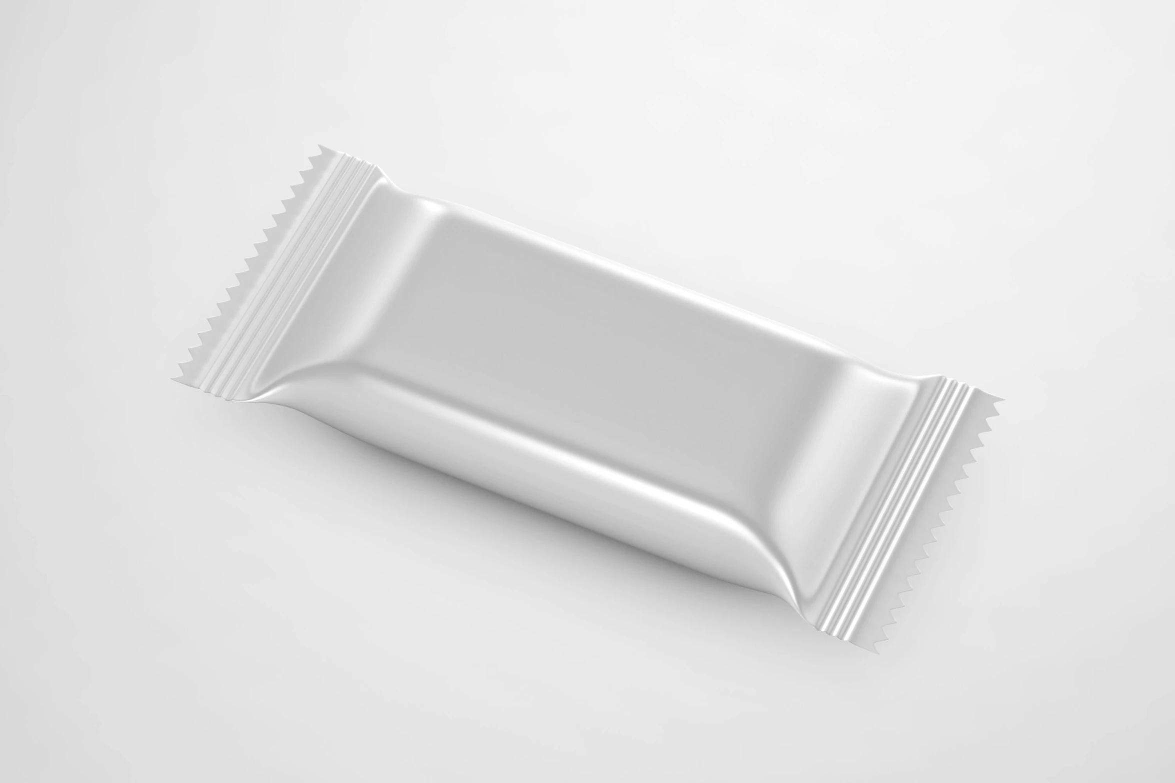 a white chocolate bar sitting on top of a table, an ambient occlusion render, by Jan Kupecký, pexels, chocolate candy bar packaging, silver chrome color, thumbnail, mini model