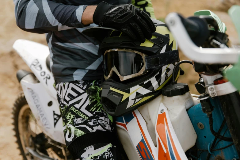 a man sitting on top of a dirt bike, helmet view, avatar image, up close image, neoprene