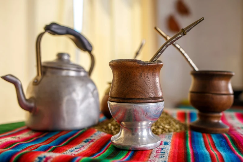 a couple of cups sitting on top of a table, in chuquicamata, profile image, fan favorite, water pipe