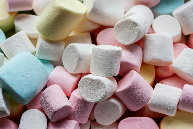 a pile of marshmallows sitting on top of each other, by Helen Stevenson, trending on pexels, pastelle colors, pastel faded grey rainbow, edible, completely dark