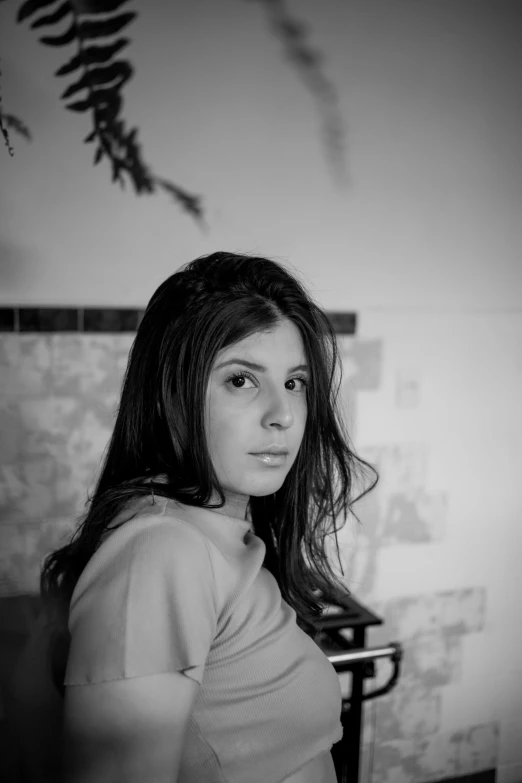 a black and white photo of a woman, by Nathalie Rattner, young woman with long dark hair, taken in 2 0 2 0, medium format. soft light, promotional image