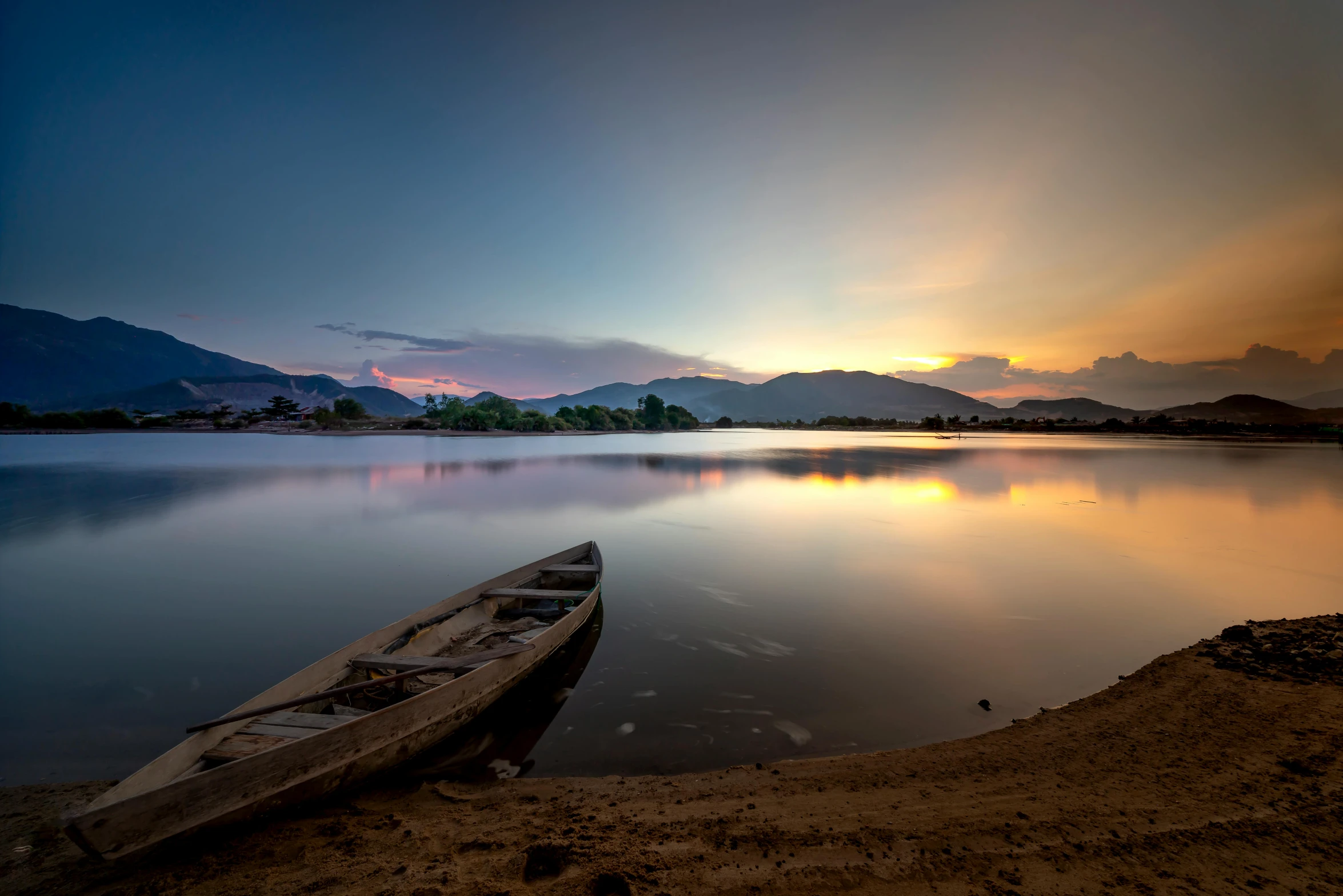 a boat sitting on top of a body of water, pexels contest winner, romanticism, laos, soft glow, sri lankan landscape, slide show