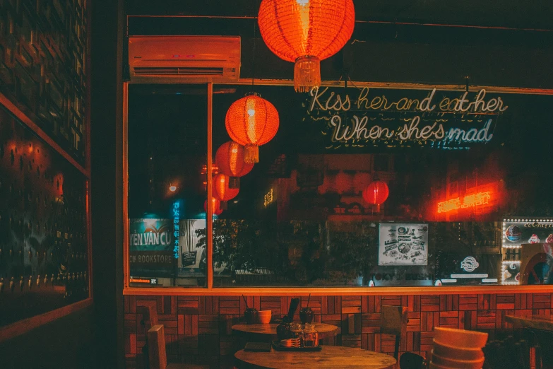 a restaurant with red lanterns hanging from the ceiling, a photo, pexels contest winner, 8 0 s asian neon movie still, background image, the window is open, small hipster coffee shop