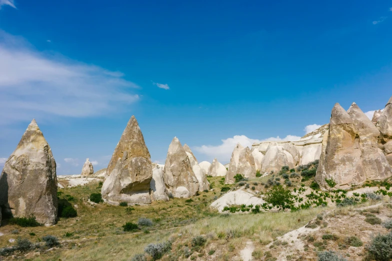 the landscape of cappadin in cappadin national park, cappadin national park, cappadin national park, cappadin, trending on unsplash, 3 5 mm photo, asymmetrical spires, ancient”