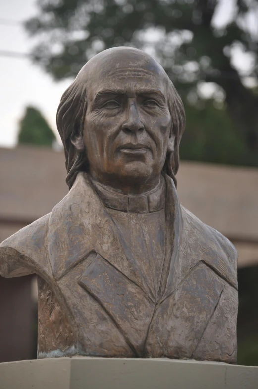 a statue of a man with long hair, a statue, inspired by Agustín Fernández, straight jawline, bald man, rafeal albuquerque, straight neck