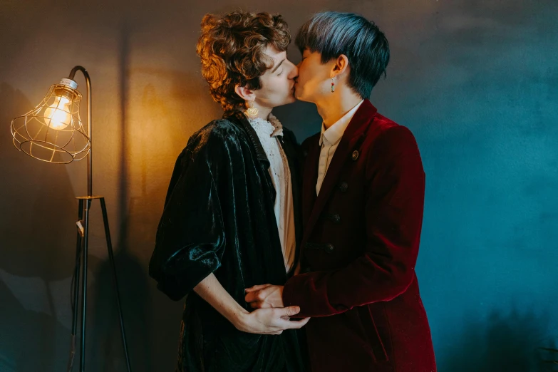 a couple of people standing next to each other, trending on pexels, renaissance, lesbian kiss, dressed in velvet, lee griggs and jason chan, cute boys