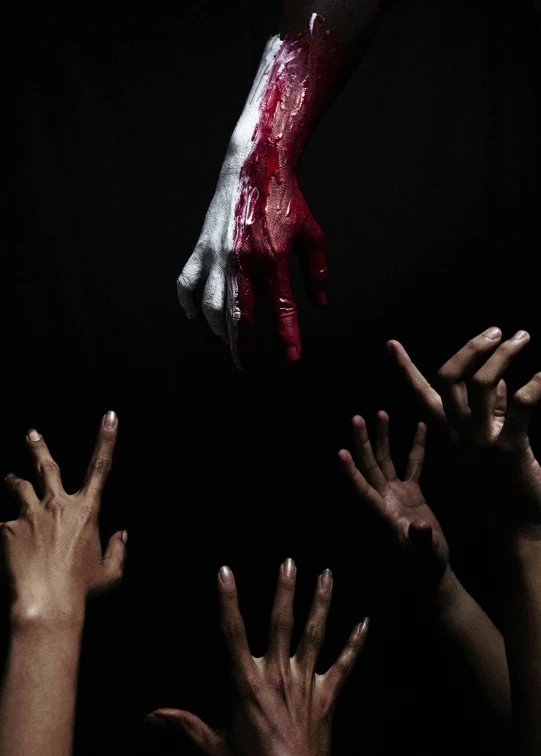 a group of hands reaching for a bloody hand, an album cover, by Alejandro Obregón, pexels contest winner, romanticism, ( ( dark skin ) ), ignant, flag in hands up, profile picture