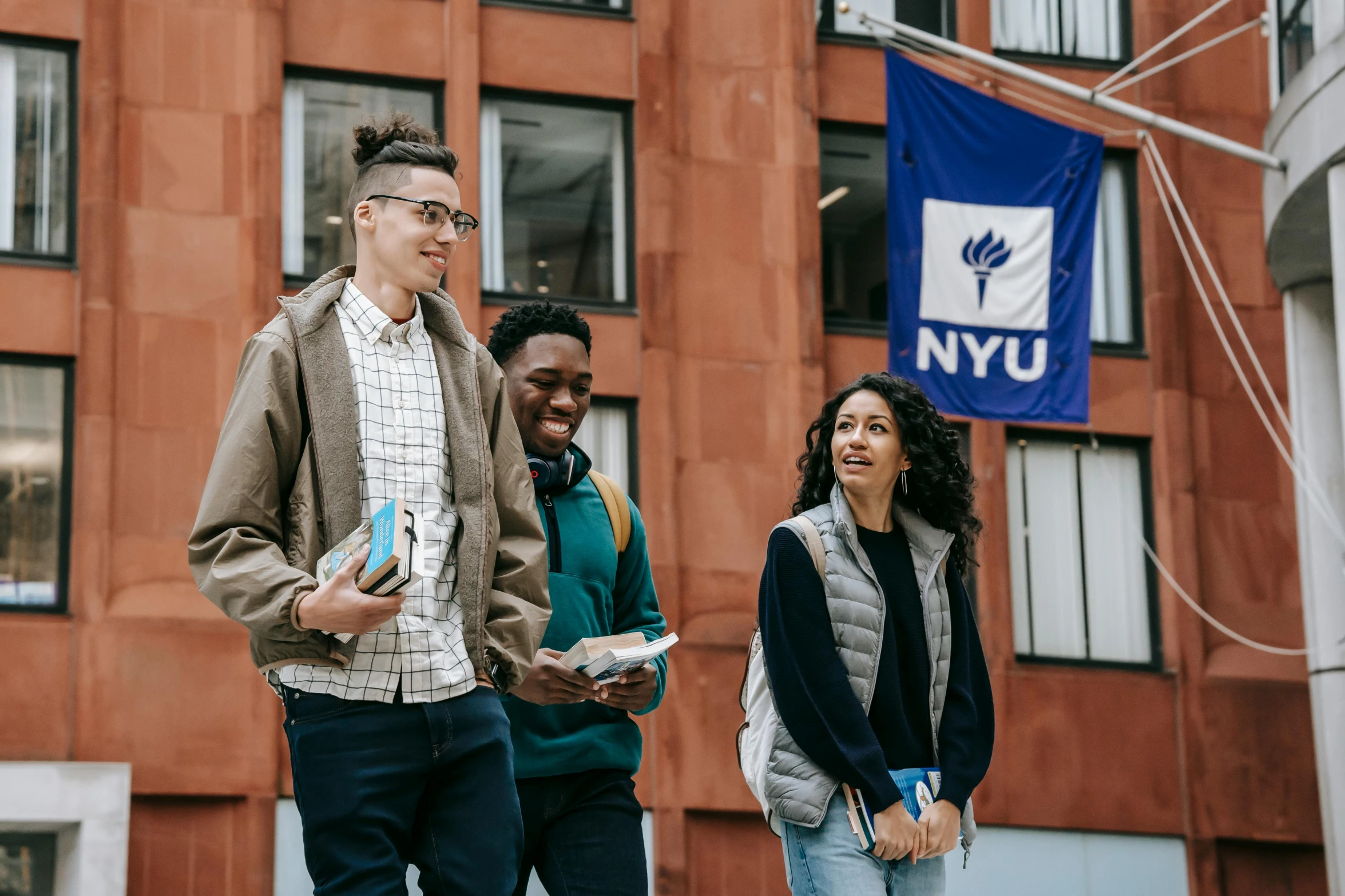 a group of people standing in front of a building, ny, at college, hi-res, banner