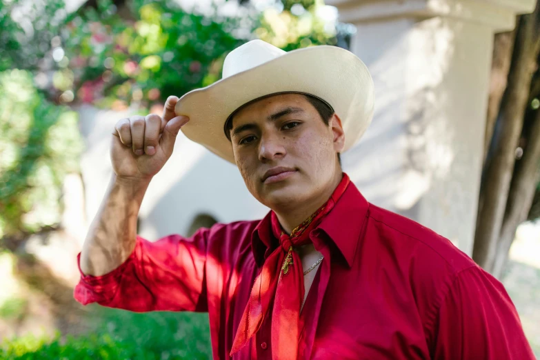 a man wearing a red shirt and a white cowboy hat, inspired by Rodolfo Morales, promo photo, portrait image, college, tlaquepaque