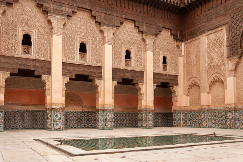 a building with a pool in the middle of it, inspired by Frederick Goodall, trending on unsplash, arabesque, marrakech, 2 5 6 x 2 5 6 pixels, tombs, ray tracing on