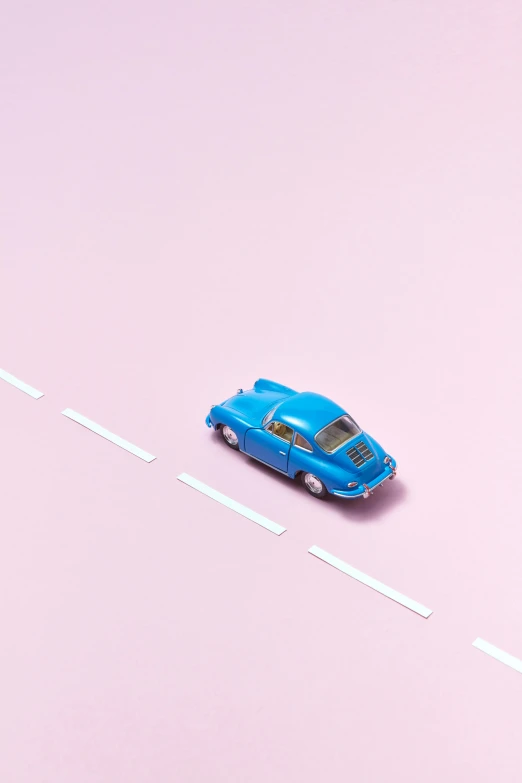 a blue toy car sitting on top of a road, by Jacob Toorenvliet, visual art, pink, flat lay, 15081959 21121991 01012000 4k, retro aesthetic