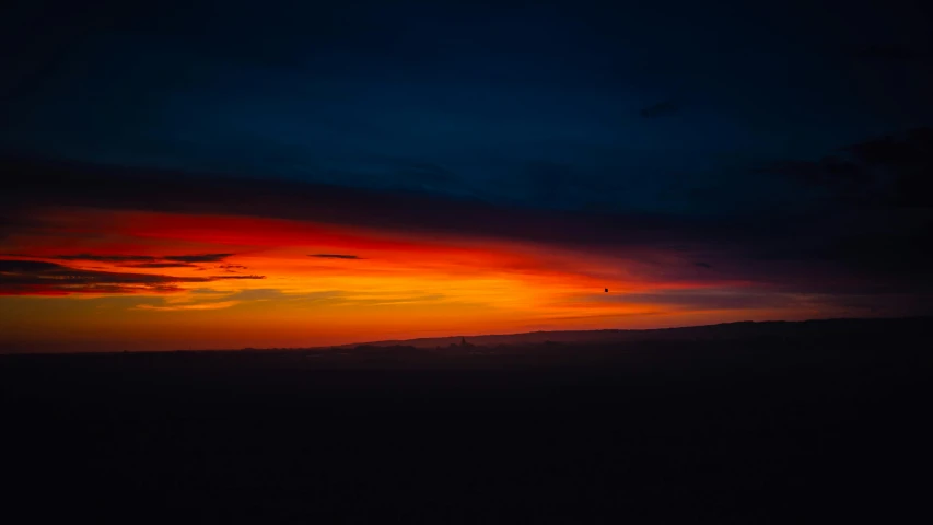 a sunset with a plane flying in the sky, pexels contest winner, minimalism, midnight colors, red hues, fine art print, some orange and blue