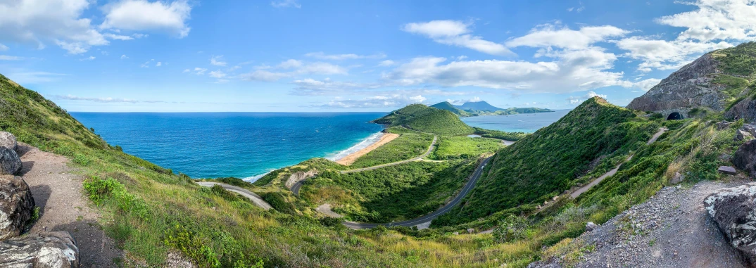 a view of the ocean from the top of a hill, by Matthias Stom, pexels contest winner, les nabis, hilly road, australian beach, 4k panoramic, caribbean