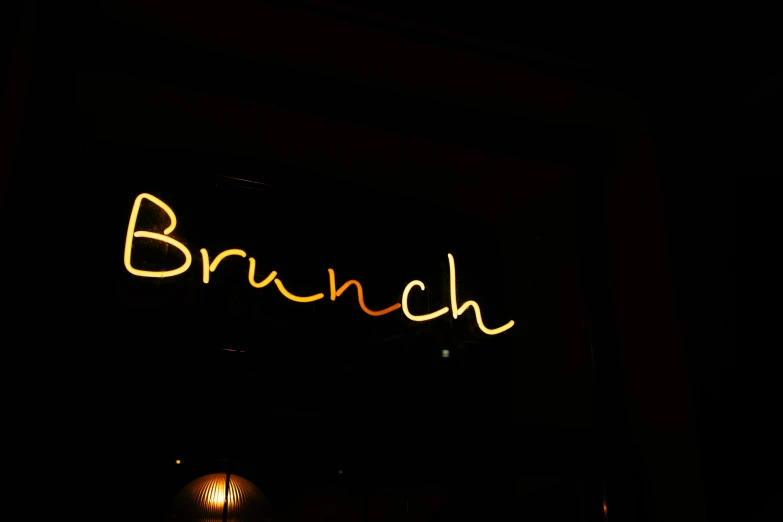 the word brunch is lit up in the dark, by Niko Henrichon, unsplash, branches, sandwich, inauguration, full daylight