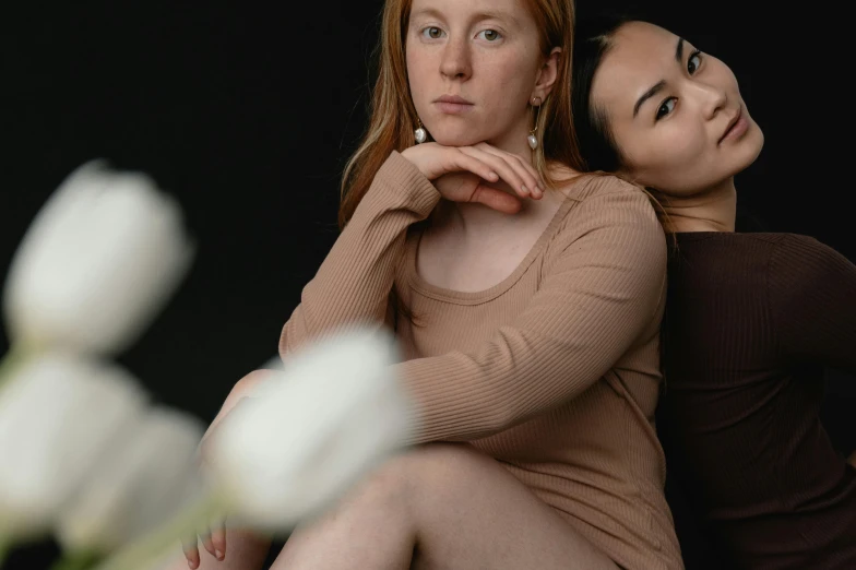 a couple of women sitting next to each other, a portrait, inspired by Wang Duo, unsplash, renaissance, body shot, lesbian, unedited, portrait image