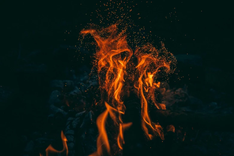 a close up of a fire in the dark, pexels contest winner, instagram post, floating embers, outdoor photo, ilustration
