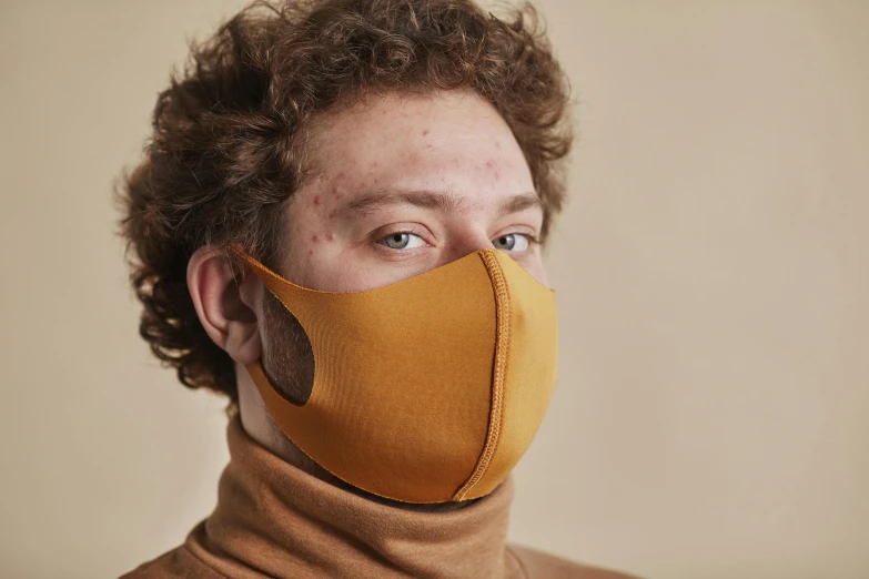 a close up of a person wearing a face mask, neoprene, ochre, width, designer product