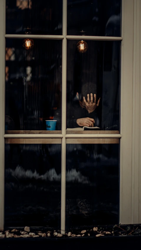 a baseball glove sitting on top of a window sill, a picture, by Elsa Bleda, pexels contest winner, realism, zombie holding coffee cup, square, enjoying coffee at a coffee shop, color ( sony a 7 r iv