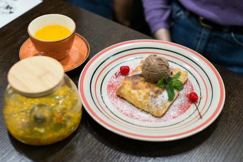 a close up of a plate of food on a table, by Emma Andijewska, desserts, けもの, cafe, jin shan