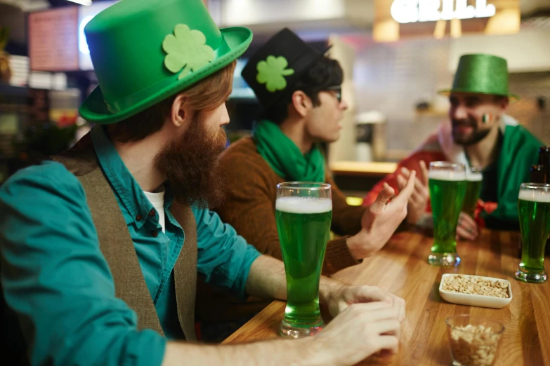 a group of men in green hats sitting at a bar, a photo, shutterstock, four leaf clover, wearing a fancy dress, beers on the table, te pae