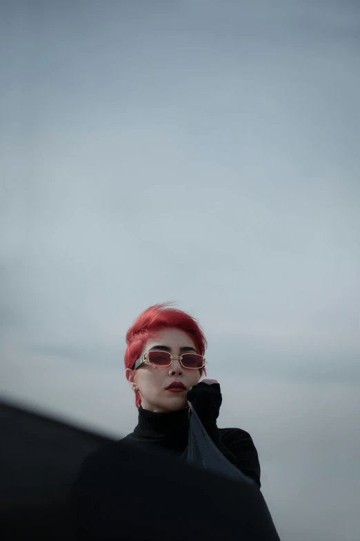 a woman with red hair talking on a cell phone, an album cover, inspired by Elsa Bleda, trending on pexels, visual art, grey sky, 15081959 21121991 01012000 4k, fashionable futuristic woman, shot from roofline