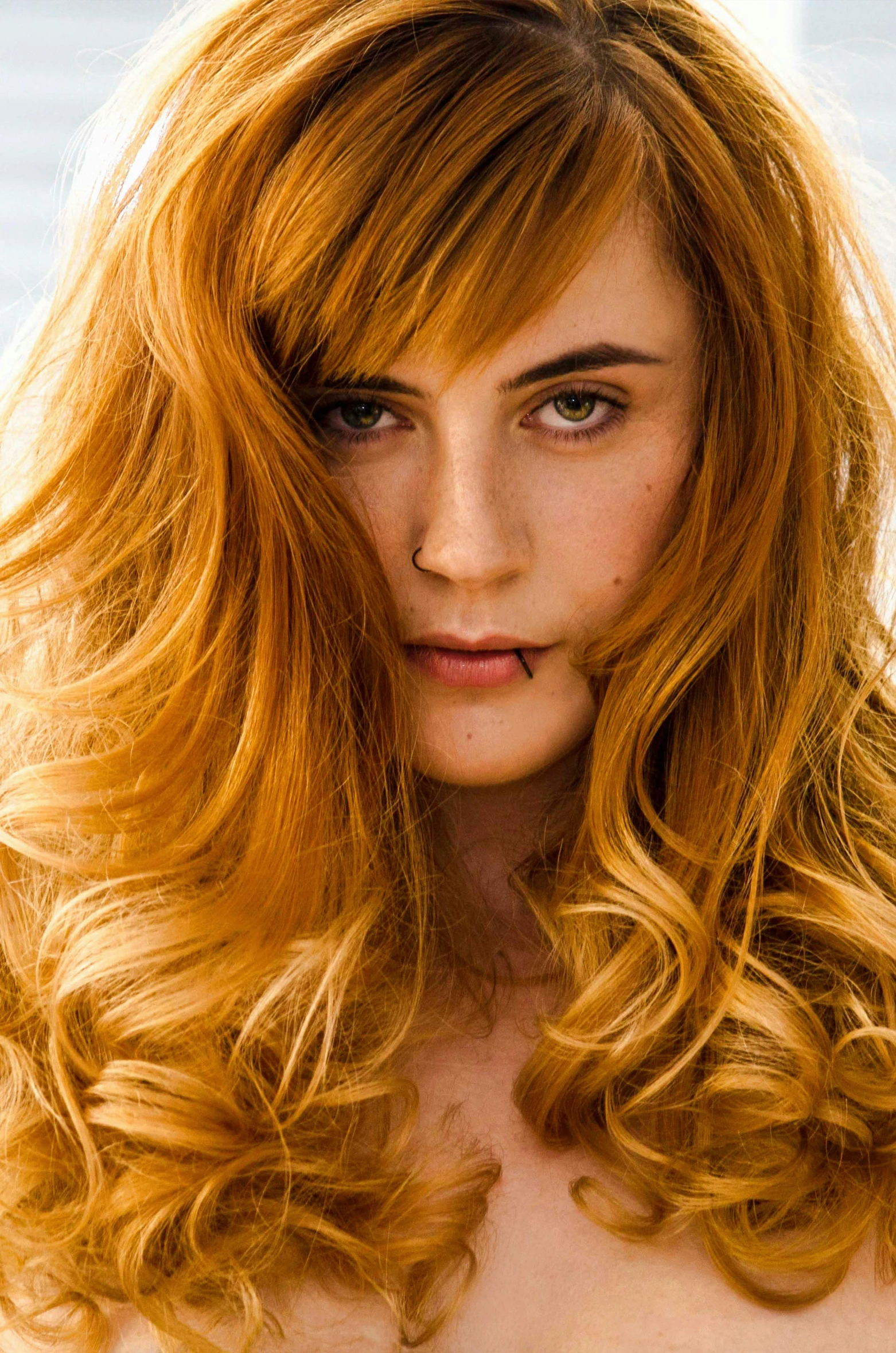 a close up of a woman with long red hair, inspired by Elsa Bleda, slide show, perfect crisp sunlight, yellow hair, her hair is natural disheveled