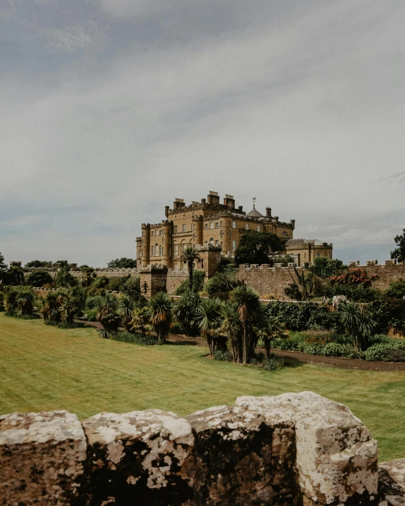 a large castle sitting on top of a lush green field, verbena, instagram post, ornately dressed, thumbnail