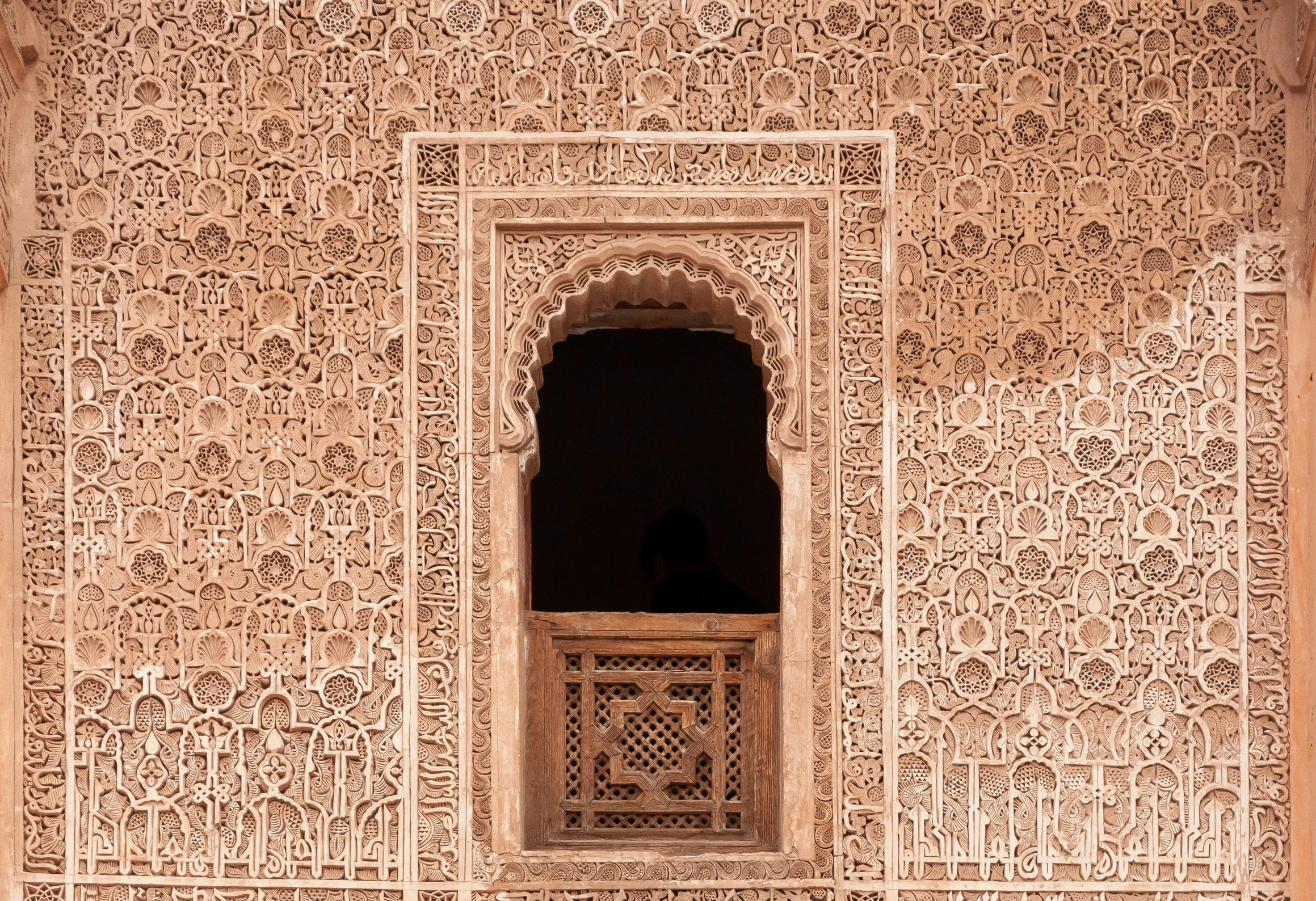 a close up of a window in a building, inspired by Alberto Morrocco, pexels contest winner, arabesque, in front of a carved screen, sand - colored walls, ornate patterned people, 3 4 5 3 1