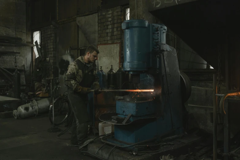 a man working on a machine in a factory, by Attila Meszlenyi, pbr materials, punching, round head, iron