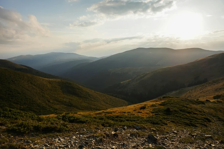 a view of the mountains from the top of a hill, by Alexander Runciman, pexels contest winner, les nabis, ukraine. photography, afternoon light, slide show, gravels around