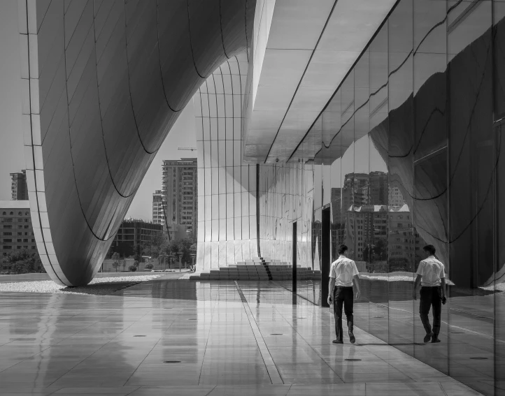 a couple of men standing next to each other, a black and white photo, by Farid Mansour, unsplash contest winner, conceptual art, in glass town, sweeping arches, lumen reflections, business men