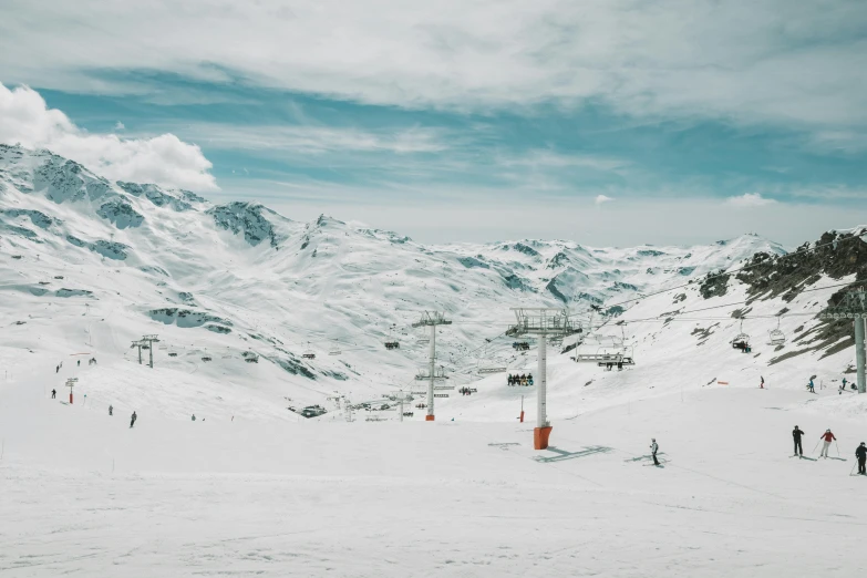 a group of people riding skis down a snow covered slope, chairlifts, top selection on unsplash, northern france, thumbnail