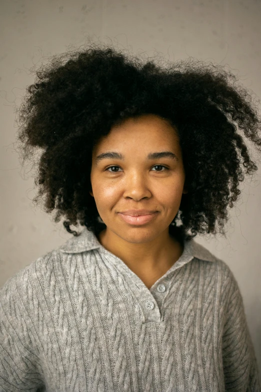 a woman with an afro is posing for a picture, portrait sabrina lloyd, journalism photo, symmetrical centered portrait, medium details