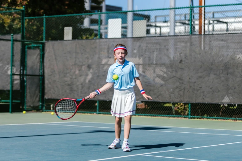 a man holding a tennis racquet on a tennis court, a portrait, by Anna Findlay, unsplash, girl wearing uniform, panoramic shot, mark miner, performing