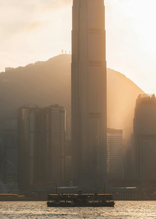 a boat in a body of water with a city in the background, a detailed matte painting, by Patrick Ching, pexels contest winner, modernism, in a sunset haze, hong kong buildings, golden hour 4k, tall minimalist skyscrapers