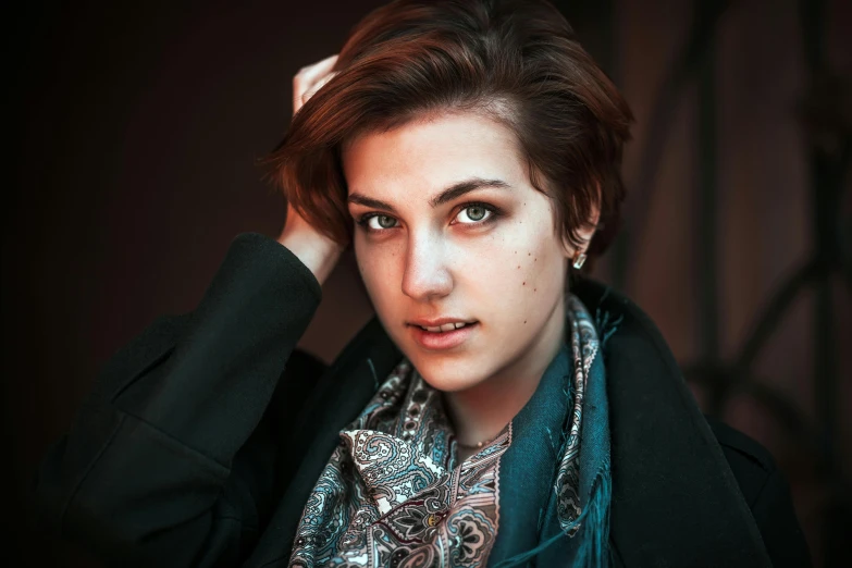 a close up of a person wearing a scarf, a character portrait, inspired by Elsa Bleda, trending on pexels, beautiful androgynous girl, brown short hair, professional photo, rectangle