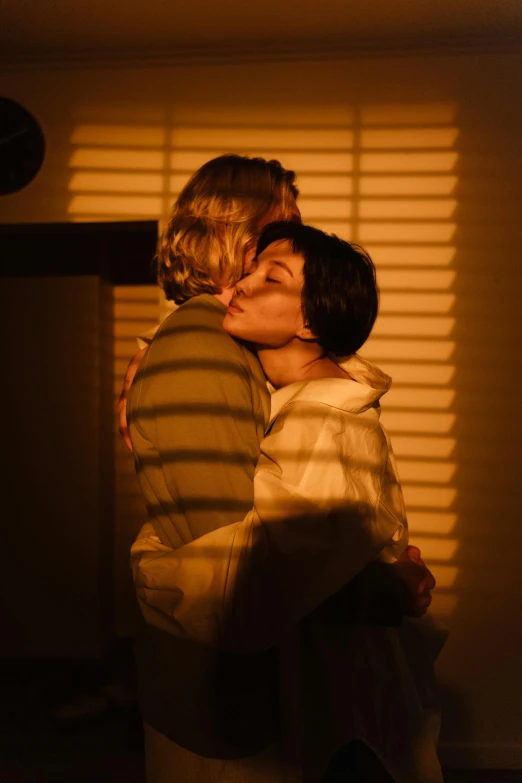 a couple of people that are hugging each other, inspired by Nan Goldin, romanticism, lesbian kiss, soft lighting 8k, ignant, cut-scene