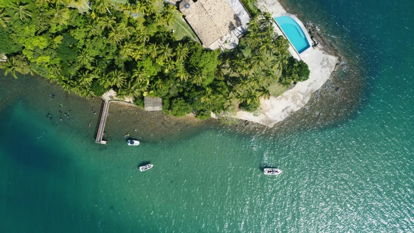 a small island in the middle of a body of water, by Felipe Seade, pexels contest winner, hurufiyya, beachfront mansion, flat lay, bored ape yacht club, salvador