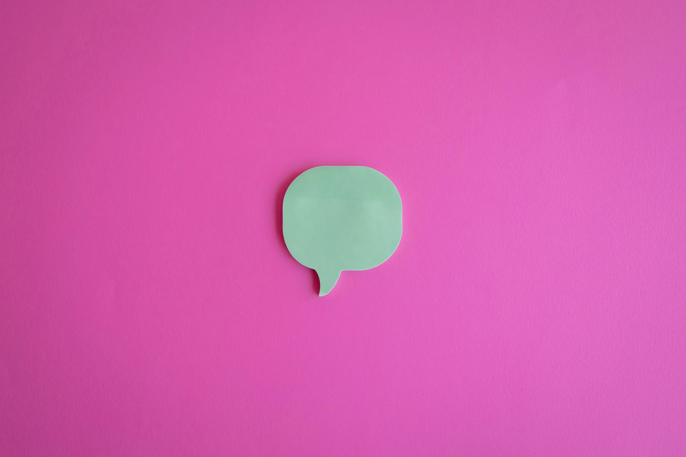 a green speech bubble on a pink background, by Julian Allen, trending on pexels, postminimalism, 2 8 mm, blueish, decoration, flat