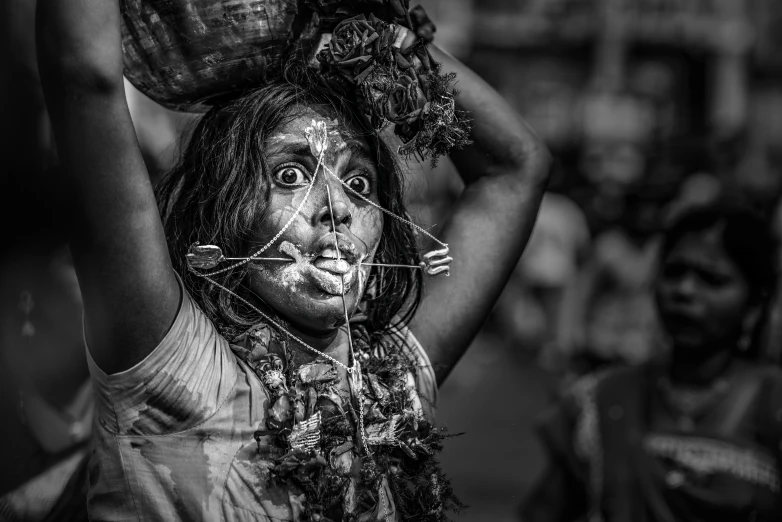 a black and white photo of a woman carrying a basket on her head, a black and white photo, by Jitish Kallat, pexels contest winner, fleshy creature above her mouth, kalighat hanuman!! head building, awarded on cgsociety, mouth wired shut