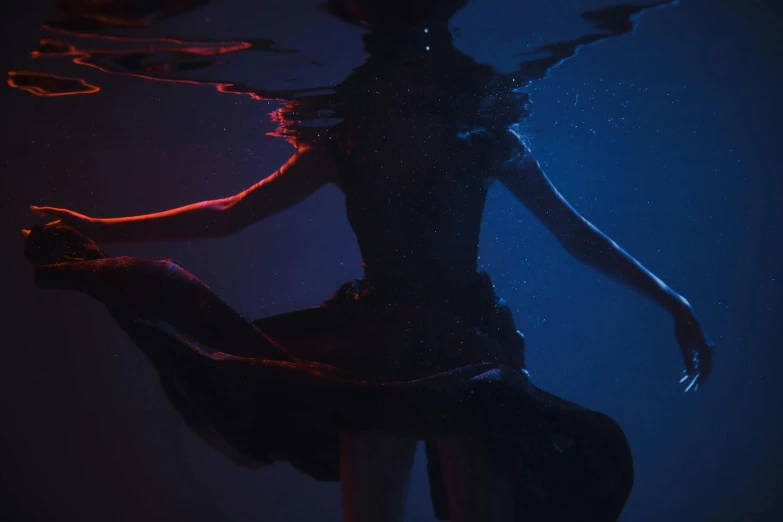 a woman that is standing in the water, an album cover, by Adam Marczyński, unsplash contest winner, conceptual art, red and blue black light, magicavoxel cinematic lighting, whirling, octane render - n 9