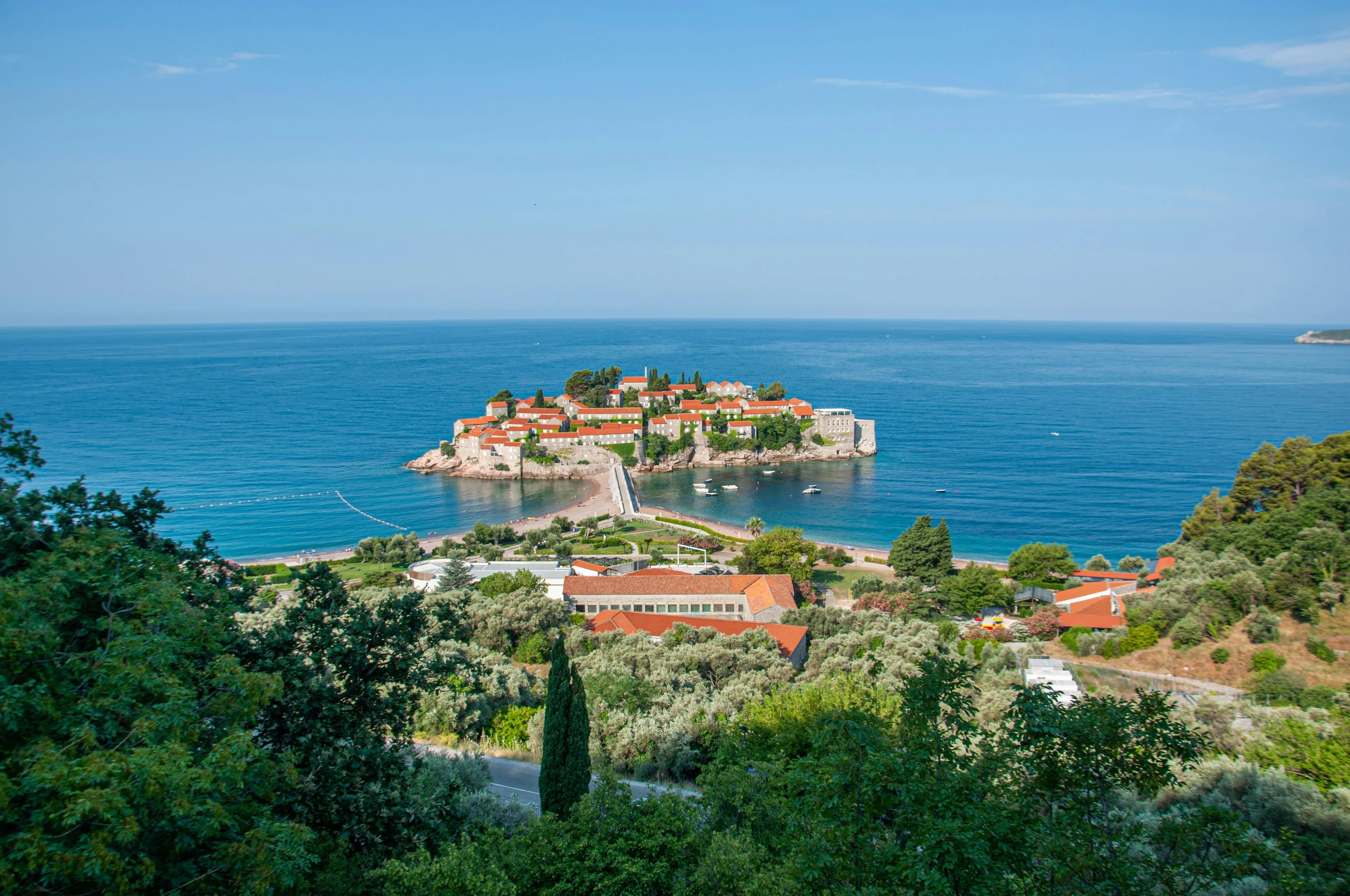 a small island in the middle of the ocean, by Jan Rustem, pexels contest winner, renaissance, white buildings with red roofs, bulgari, panoramic, parks and gardens